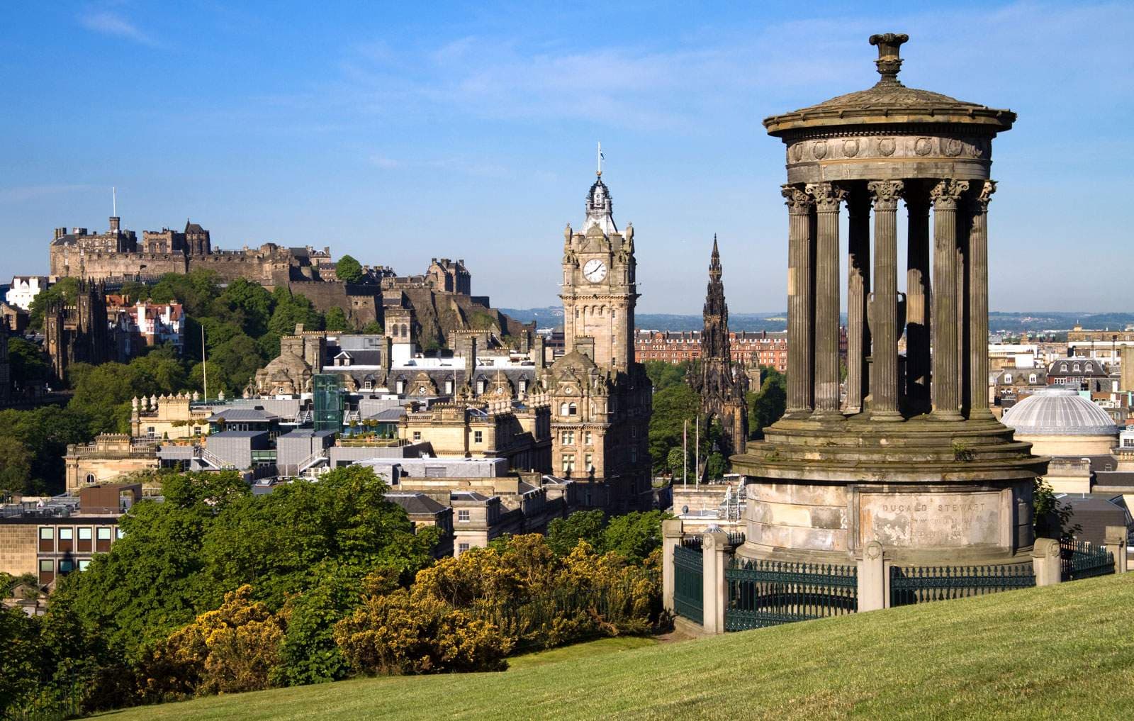 A vibrant city skyline with iconic landmarks and bustling streets, showcasing urban energy and charm